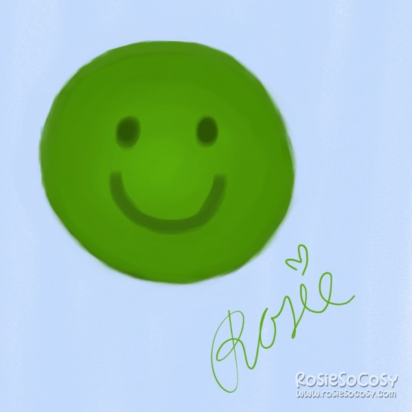 A big green emoticon, inspired by the green "friend" icons from The Sims 2. The emoticon is smiling. The background is a soft blue colour.