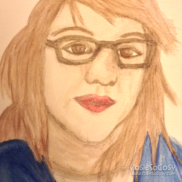 Self portrait of Rosie, done in watercolour. Rosie is wearing black frame glasses, a blue cardigan and has red lips. Her hair is brown, and she has brown eyes. She's looking at the camera, with a neutral face.