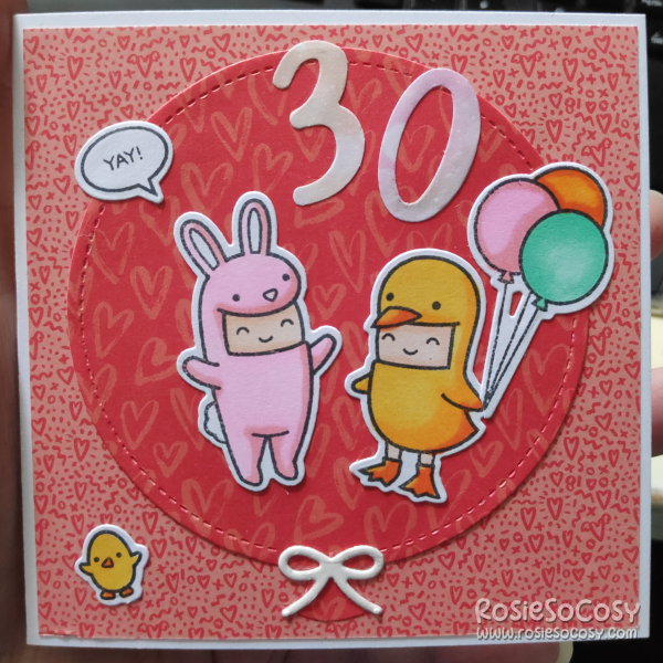 A red birthday card with two characters, dressed up as a pink bunny and a yellow chick. Above it there's 30 in white. The background is a red balloon. There's a small yellow chick in the bottom left corner. The character with yellow chick is holding 3 balloons in pink, orange and turquoise.