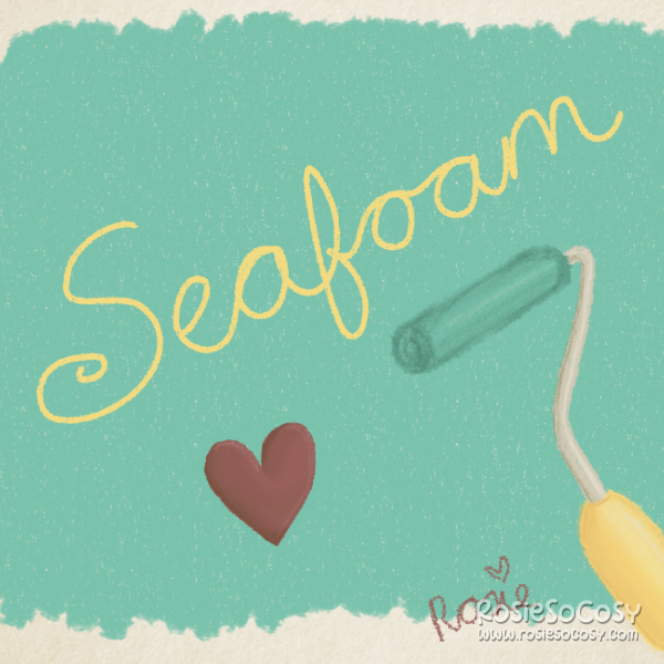 There's a yellow paint roller painting the background a seafoam colour. The seafoam is in a rectangular shape. On top of the rectangle there's the word Seafoam written together in yellow. Below on the seafoam rectangle is a red heart.