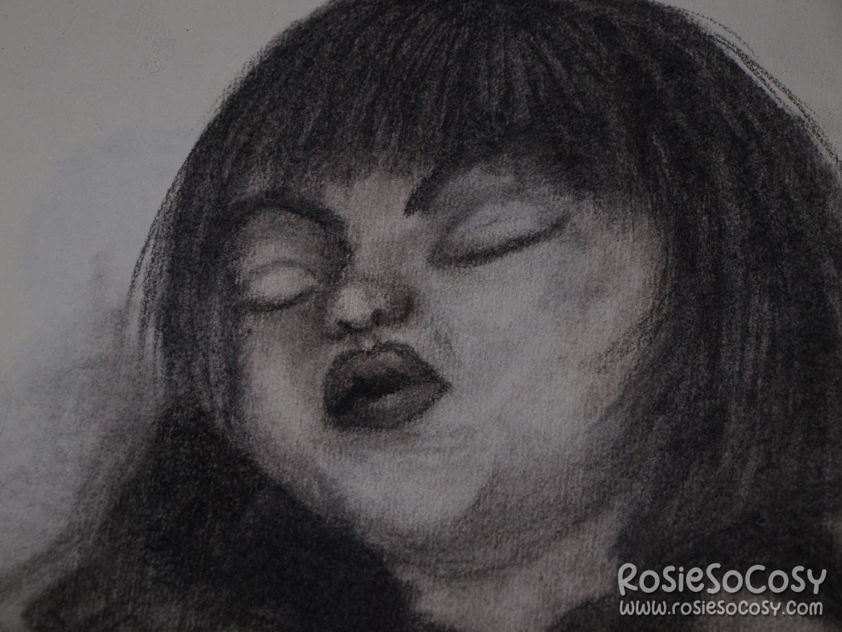 Charcoal drawing of a little boy (toddler age) sleeping with his eyes closed. His head is tilted backwards.
